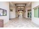 Elegant community clubhouse entrance with tile flooring at 9482 Bolero Rd, Winter Garden, FL 34787