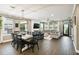 Open concept dining room with wooden table and seating for six at 9482 Bolero Rd, Winter Garden, FL 34787