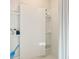 Modern bathroom with a large shower and built-in shelving at 1292 Hanoverian Dr, Lake Alfred, FL 33850