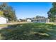 Spacious backyard with large grassy area at 2588 Sun Acres Blvd, Auburndale, FL 33823