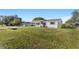 Newly renovated home with a spacious lawn at 2588 Sun Acres Blvd, Auburndale, FL 33823