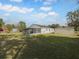 Large backyard with a screened porch and detached garage at 3334 Mount Tabor Rd, Lakeland, FL 33810