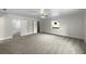 Large bedroom with plush carpeting and access to the bathroom at 3334 Mount Tabor Rd, Lakeland, FL 33810
