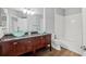 Bathroom with double sinks, granite countertop, and updated fixtures at 3725 Conroy Rd # 2131, Orlando, FL 32839