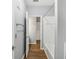 Bathroom with white tile shower/tub combo, toilet and open door at 3725 Conroy Rd # 2131, Orlando, FL 32839