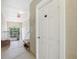 Hallway with storage unit and exit stairs at 3725 Conroy Rd # 2131, Orlando, FL 32839