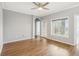 Spacious, unfurnished living room with wood-style flooring and ample natural light at 3725 Conroy Rd # 2131, Orlando, FL 32839