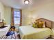 Bedroom with built-in desk and window seating at 6098 Galloping Dr, Apopka, FL 32712