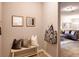 Inviting entryway with a bench and storage at 6098 Galloping Dr, Apopka, FL 32712
