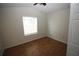 Bedroom with hardwood floors and a window with blinds at 825 Grand Regency Pointe # 200, Altamonte Springs, FL 32714