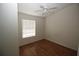 Bedroom with hardwood floors and a ceiling fan at 825 Grand Regency Pointe # 200, Altamonte Springs, FL 32714
