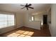 Living room with hardwood floors and a ceiling fan at 825 Grand Regency Pointe # 200, Altamonte Springs, FL 32714