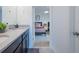 Shared bathroom with double sinks and access to bedroom at 8933 Amelia Downs Trl, Kissimmee, FL 34747
