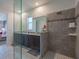 Modern bathroom with walk-in shower and double vanity at 8933 Amelia Downs Trl, Kissimmee, FL 34747