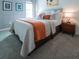 Bedroom with mid-century modern furniture and space-themed decor at 8933 Amelia Downs Trl, Kissimmee, FL 34747