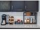 Well-organized coffee bar with various coffee supplies at 8933 Amelia Downs Trl, Kissimmee, FL 34747