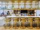 Community coffee bar with barstools at 8933 Amelia Downs Trl, Kissimmee, FL 34747