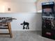 Game room featuring Star Wars arcade game and foosball at 8933 Amelia Downs Trl, Kissimmee, FL 34747