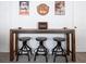 Star Wars themed game room with bar-height table and stools at 8933 Amelia Downs Trl, Kissimmee, FL 34747