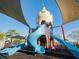 Castle-themed playground with slides at 8933 Amelia Downs Trl, Kissimmee, FL 34747