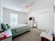 Bedroom with a double bed, dresser, and ceiling fan at 944 Torrey Pine Dr, Winter Springs, FL 32708