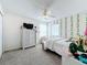 Bedroom with a double bed, dresser, and leafy wall decor at 944 Torrey Pine Dr, Winter Springs, FL 32708