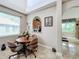 Bright breakfast nook with a table and chairs, offering a view into the kitchen at 944 Torrey Pine Dr, Winter Springs, FL 32708