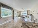 Bright dining area with large windows and view of backyard at 944 Torrey Pine Dr, Winter Springs, FL 32708
