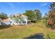 Two-story house exterior and pond view at 944 Torrey Pine Dr, Winter Springs, FL 32708