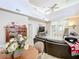Open living room with high ceilings and a TV at 944 Torrey Pine Dr, Winter Springs, FL 32708