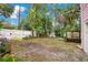 Spacious backyard with wooden fence and gate at 1217 Magnolia Ave, Sanford, FL 32771