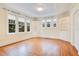 Bright dining room with hardwood floors and built-in shelving at 1217 Magnolia Ave, Sanford, FL 32771