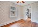 Formal dining room with hardwood floors and view of kitchen at 1217 Magnolia Ave, Sanford, FL 32771