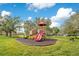 Community playground with slides and climbing structures at 1217 Magnolia Ave, Sanford, FL 32771