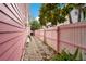 Landscaped side yard with gravel pathway at 1217 Magnolia Ave, Sanford, FL 32771