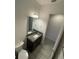 Bathroom with vanity, sink, toilet, and tiled floor at 13007 Bromborough Dr, Orlando, FL 32832