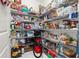 Well-stocked pantry with ample shelving for storage at 1474 Olympic Club Blvd, Champions Gate, FL 33896