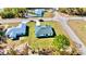 An aerial shot of two new houses on a quiet street in a residential community at 14949 Sw 65Th Avenue Rd, Ocala, FL 34473