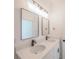 Modern bathroom with double vanity and updated lighting at 14949 Sw 65Th Avenue Rd, Ocala, FL 34473