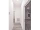 Hallway leading to garage and bathroom at 14949 Sw 65Th Avenue Rd, Ocala, FL 34473