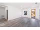 Spacious living area featuring light gray vinyl plank floors at 14949 Sw 65Th Avenue Rd, Ocala, FL 34473