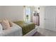 Cozy bedroom with window, dresser, and full-size bed at 1528 Ellesmere Ave, Haines City, FL 33844