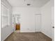 Bedroom with carpet flooring, neutral walls and ensuite bathroom at 159 Deepcove Rd, Winter Garden, FL 34787