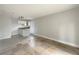 Small galley kitchen with white cabinets and tile floor at 2051 Cherry Ln, Mount Dora, FL 32757