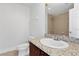 Clean bathroom with granite vanity and tile shower at 225 W Seminole Blvd # 512, Sanford, FL 32771