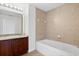 Bathroom with single vanity, granite countertop and bathtub at 225 W Seminole Blvd # 512, Sanford, FL 32771