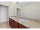 Double vanity bathroom with granite countertop and large mirror at 225 W Seminole Blvd # 512, Sanford, FL 32771