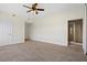 Spacious bedroom with carpet flooring and en-suite bathroom at 225 W Seminole Blvd # 512, Sanford, FL 32771