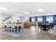 Community room with seating, dining table, and lake views at 225 W Seminole Blvd # 512, Sanford, FL 32771