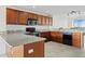 Modern kitchen featuring granite countertops and stainless steel appliances at 225 W Seminole Blvd # 512, Sanford, FL 32771